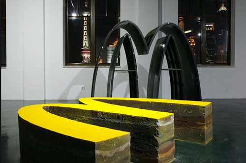 McDonalds logo in soil