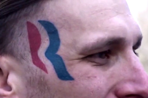 Romney logo tattoo
